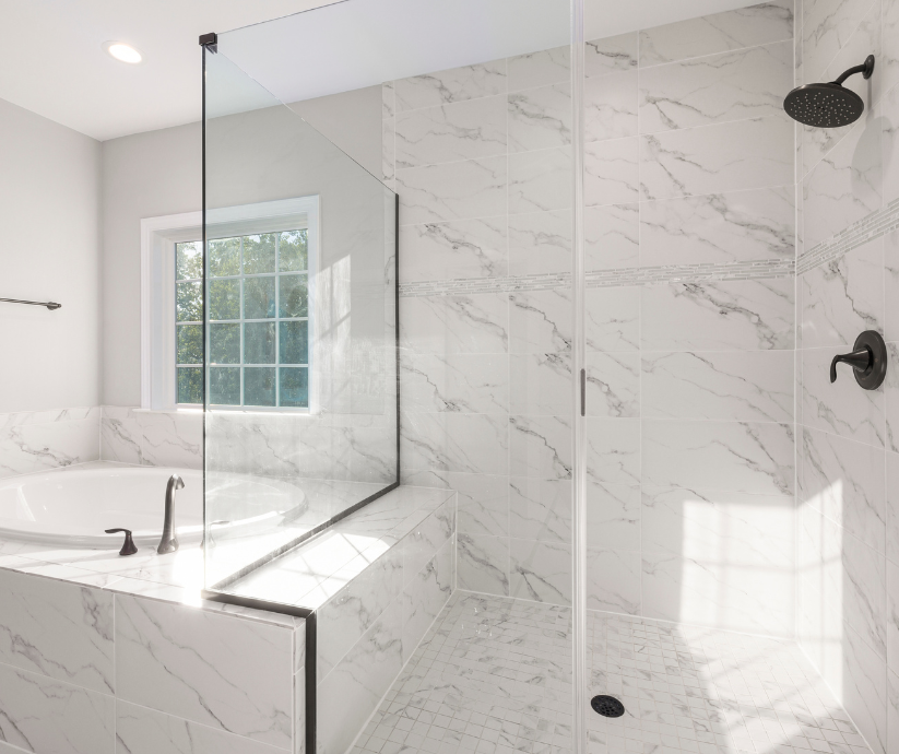 Modern bathroom with new shower and bathtub fixtures installed